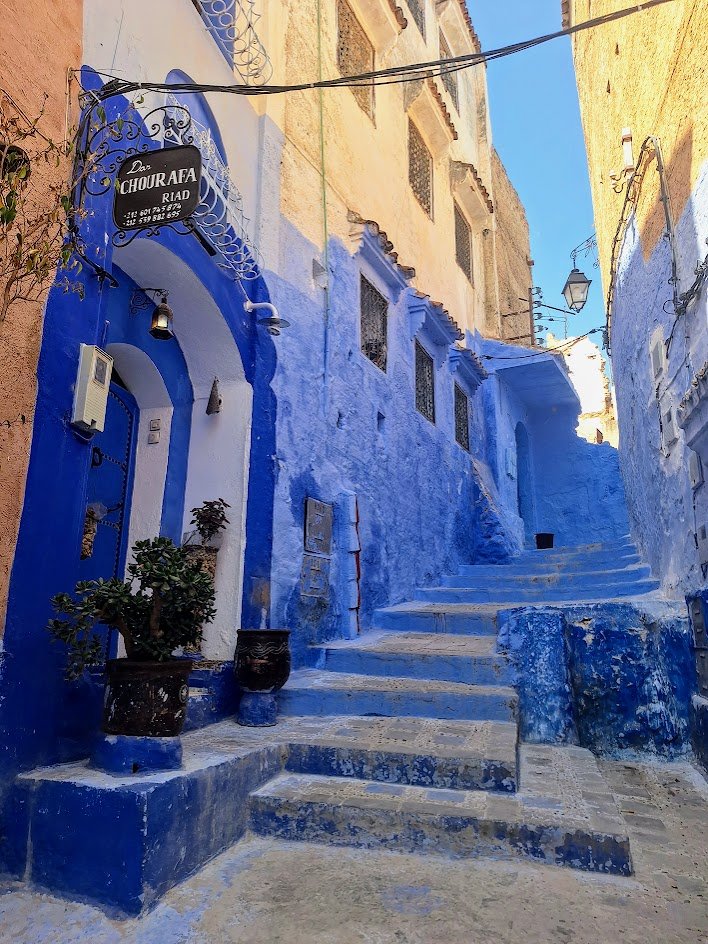 Blue stairs beside Riad Dar Chourafa in Chefchaouen